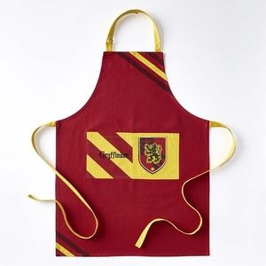 Brand new! Harry Potter Gryffindor adult apron, never opened!